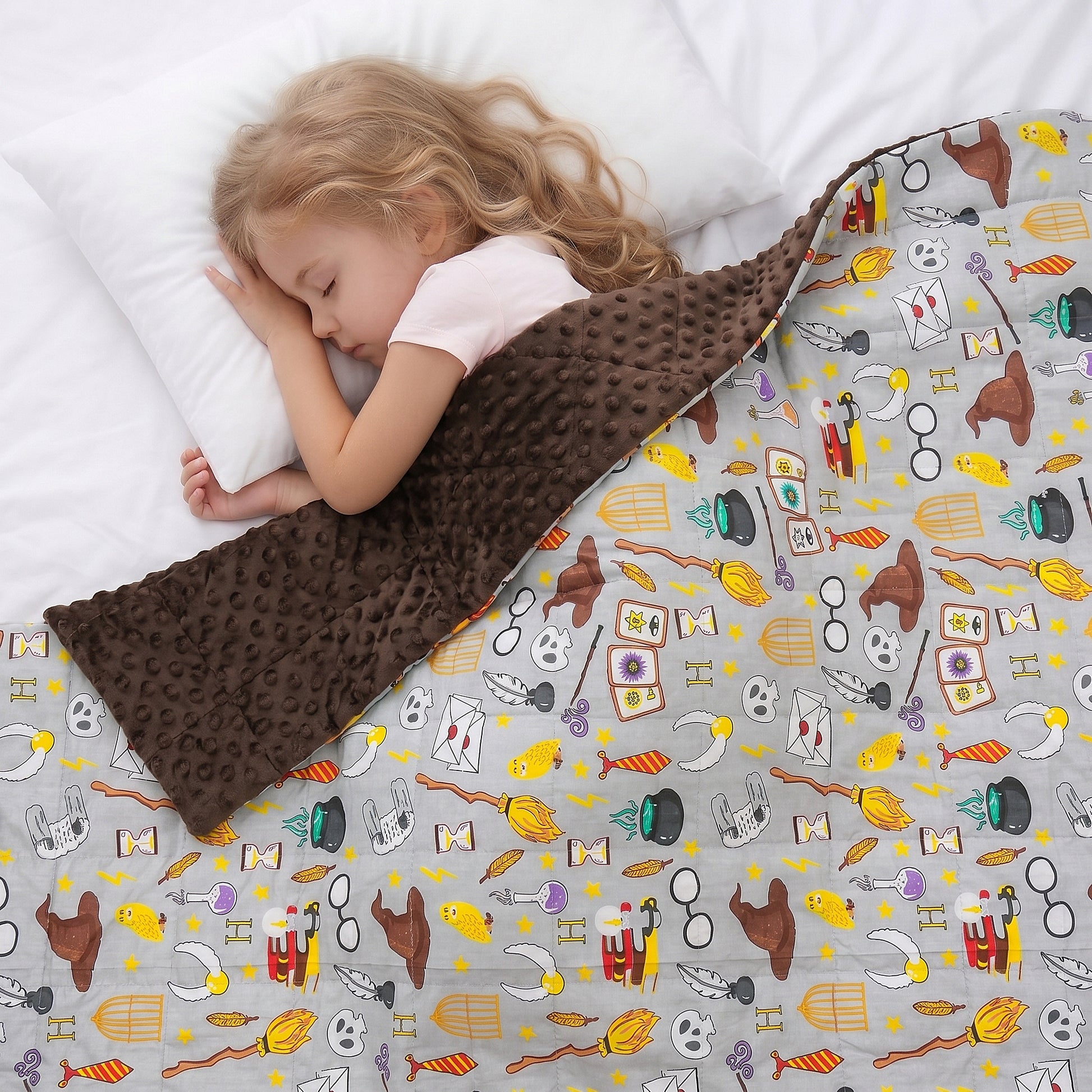 a girl seeping under the school of magic weighted blanket