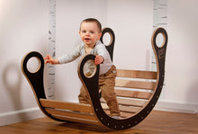 Laden Sie das Bild in den Galerie-Viewer, A child playing in good wood rocker colour black
