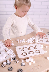 goodwood rocker table girl in white playing winter games