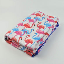 Laden Sie das Bild in den Galerie-Viewer, pink, blue and orange flamingo pattern weighted blanket by sensory owl