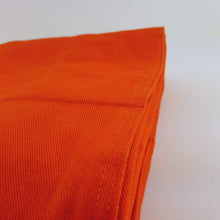 Laden Sie das Bild in den Galerie-Viewer, orange cotton weighted blanket close up photo